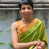 Vera - Apple green kanchipuram silk saree with mustard border
