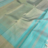 Charita turquoise gold silver checked kanchipuram silk saree