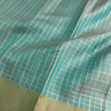 Charita turquoise gold silver checked kanchipuram silk saree
