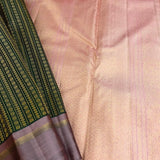 Tejasvi green dusty pink thread woven Kanchipuram silk saree