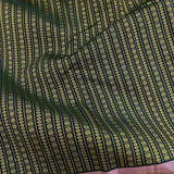 Tejasvi green dusty pink thread woven Kanchipuram silk saree