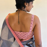 Pink printed sleeveless blouse