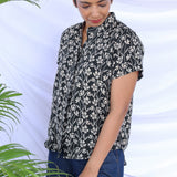 Black floral shirt